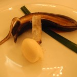 Baked banana with a warm chocolate spring roll and honey ice cream