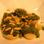 Ravioli stuffed with potatoes, string beans, Genoese curd and basil pesto sauce