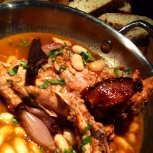Rabbit leg stew with white bean cassoulet
